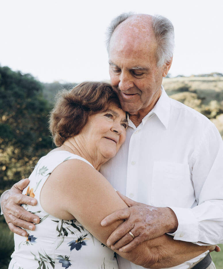 Older couple embracing