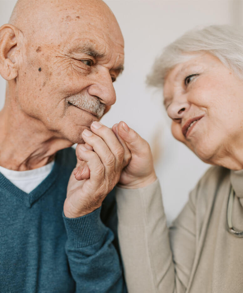 Couple holding hands together