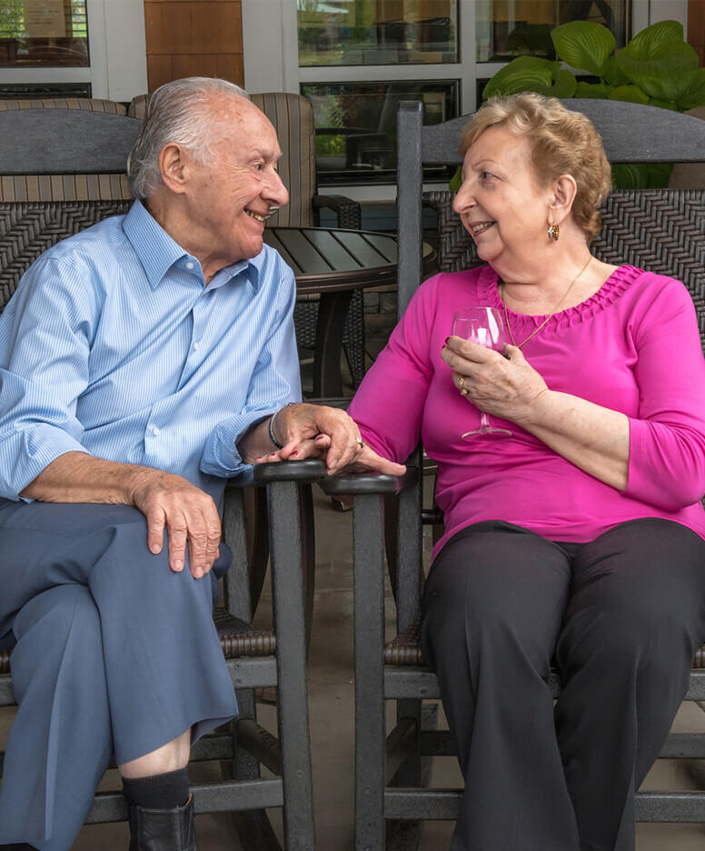 Older couple sitting and talking