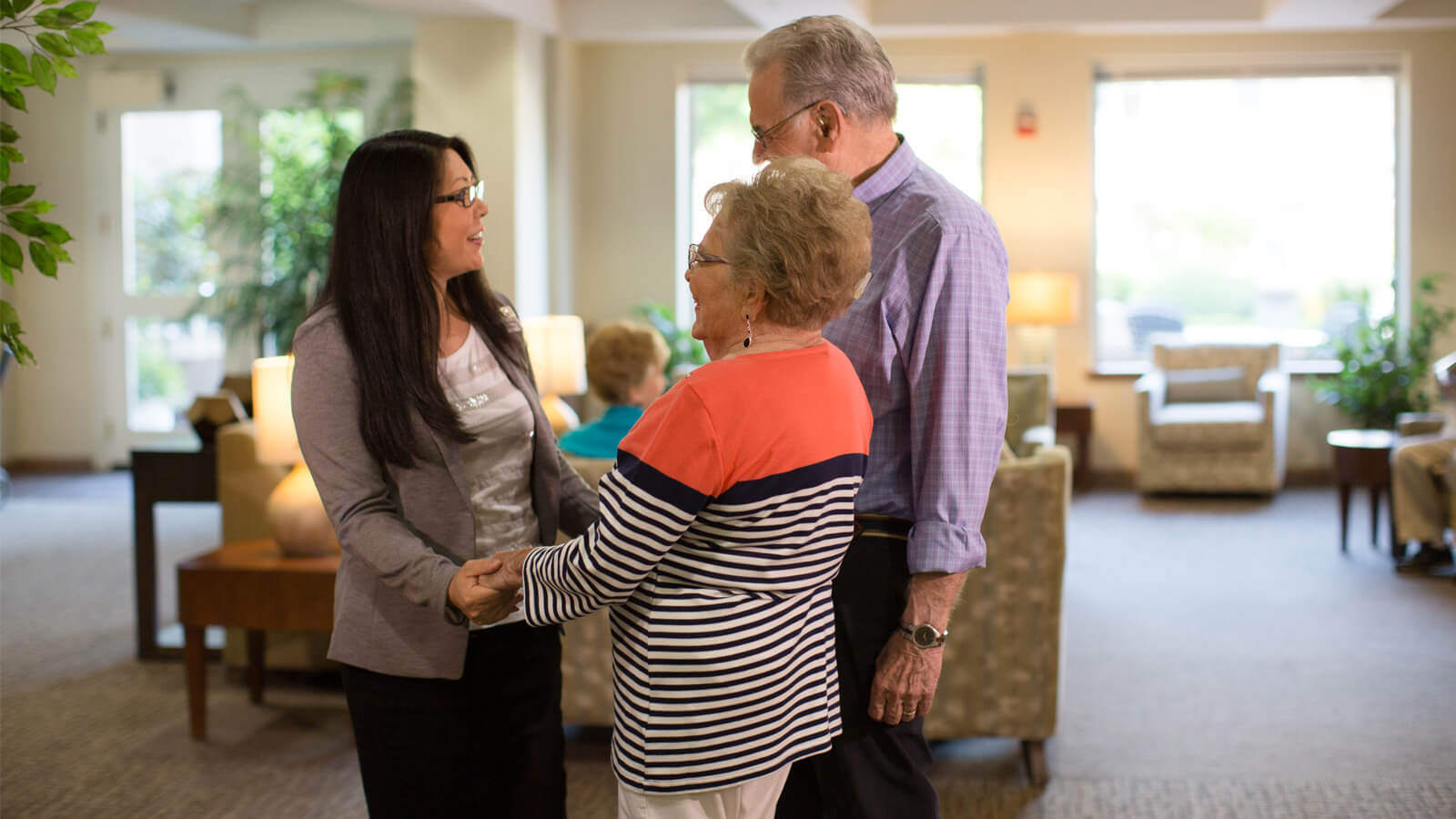 Group of people talking about senior living