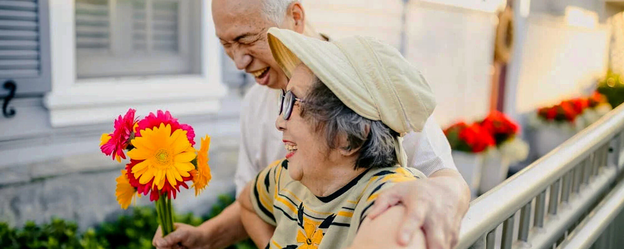 Older couple with flowers