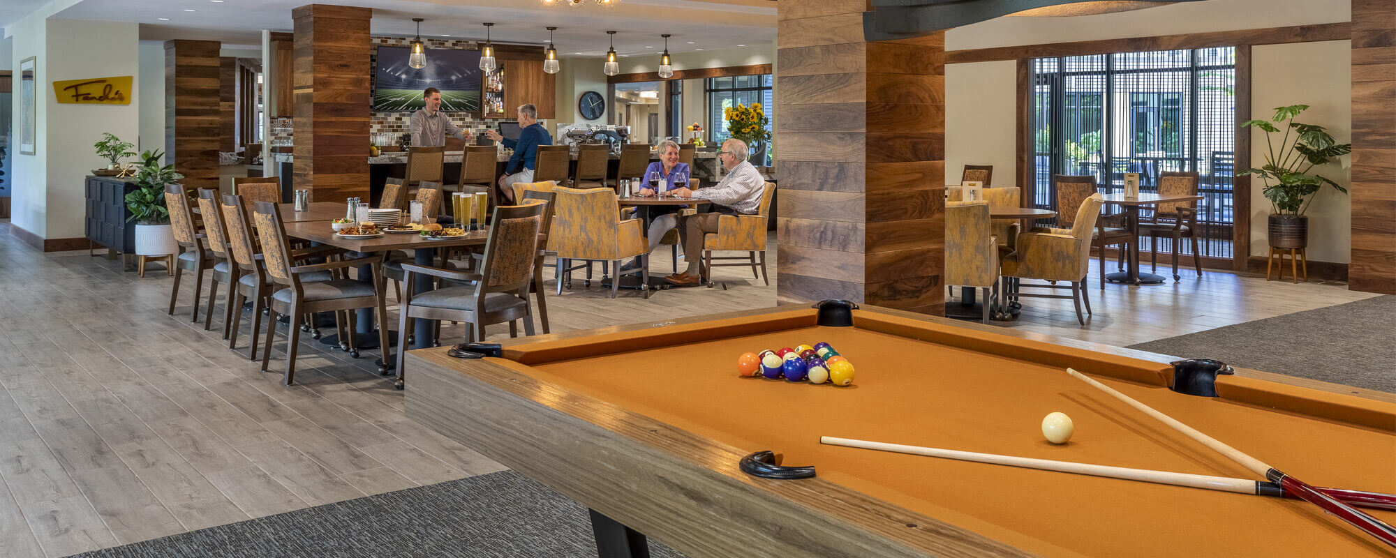 Pool table and cafe area at Lake Oswego community