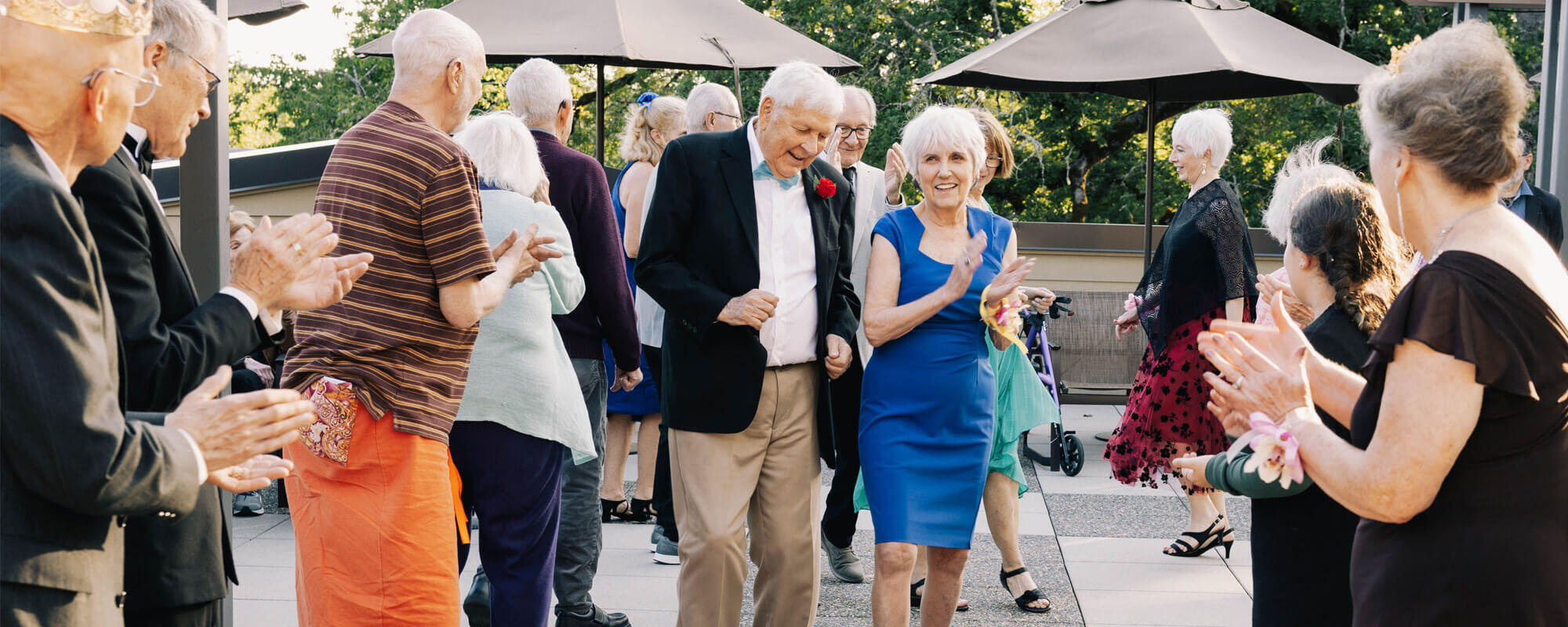 Residents dancing on an outdoor patio