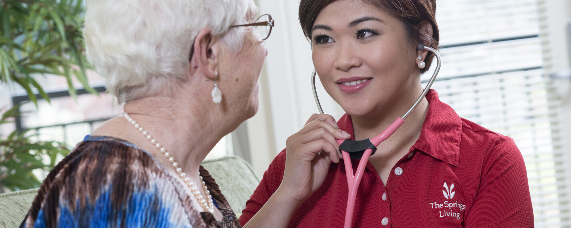 Nurse consulting with a resident at the Veranda Park community