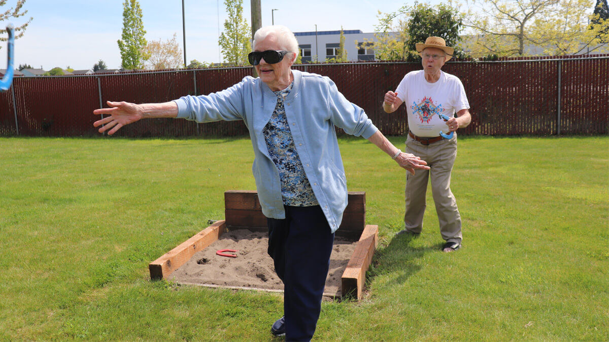 Residents playing horseshoes at the Sunnyview community