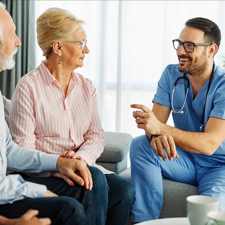 senior-couple-talking-with-a-friendly-doctor-2026-01-07-07-05-38-utc_web