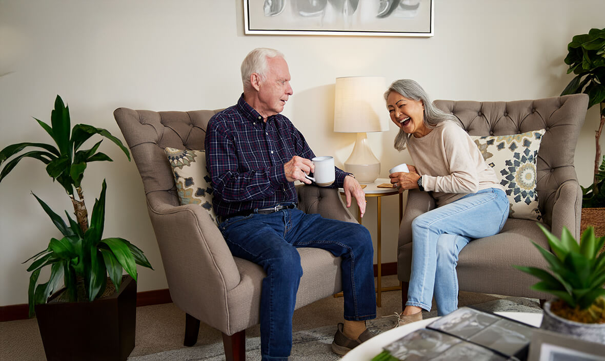 Man and woman drinking coffee together