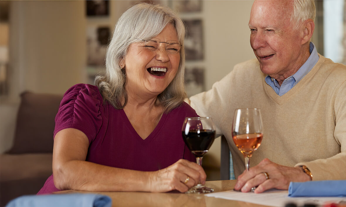Man and woman having wine together