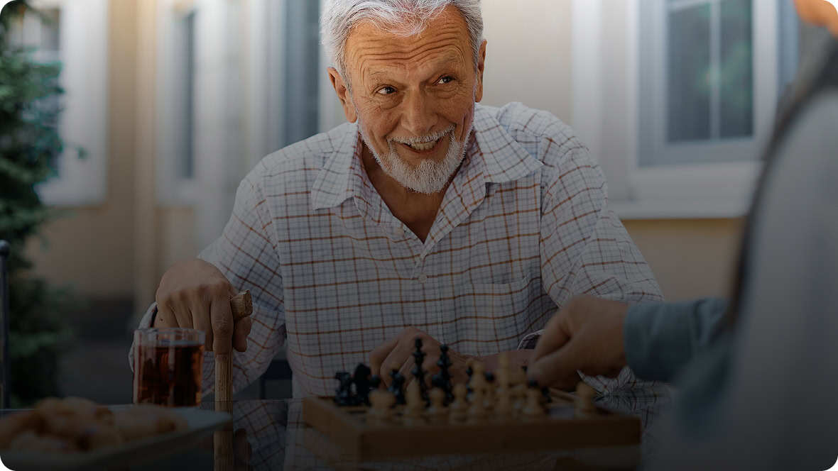 Man playing chess outdoors