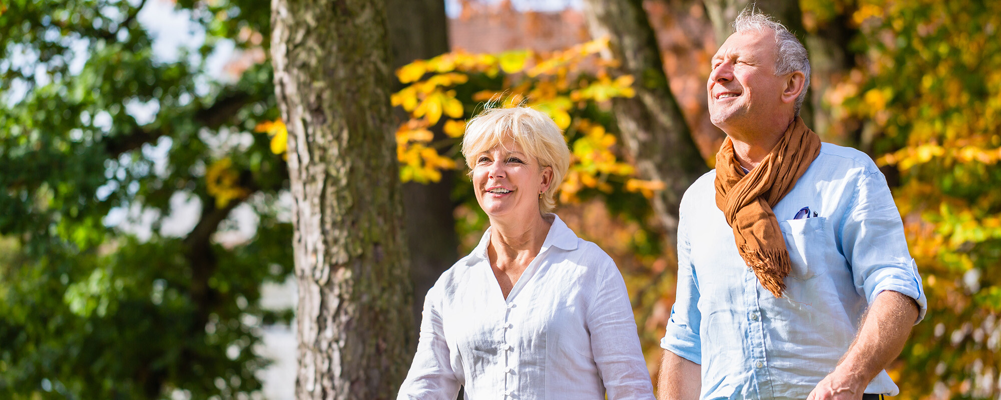 Senior man and woman, husband and wife, embracing each other in love