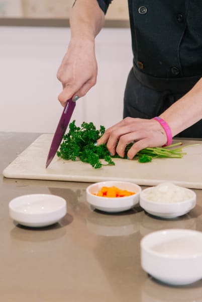 Preparing the best clam chowder recipe for senior living residents at The Springs Living at Sherwood, Oregon retirement 