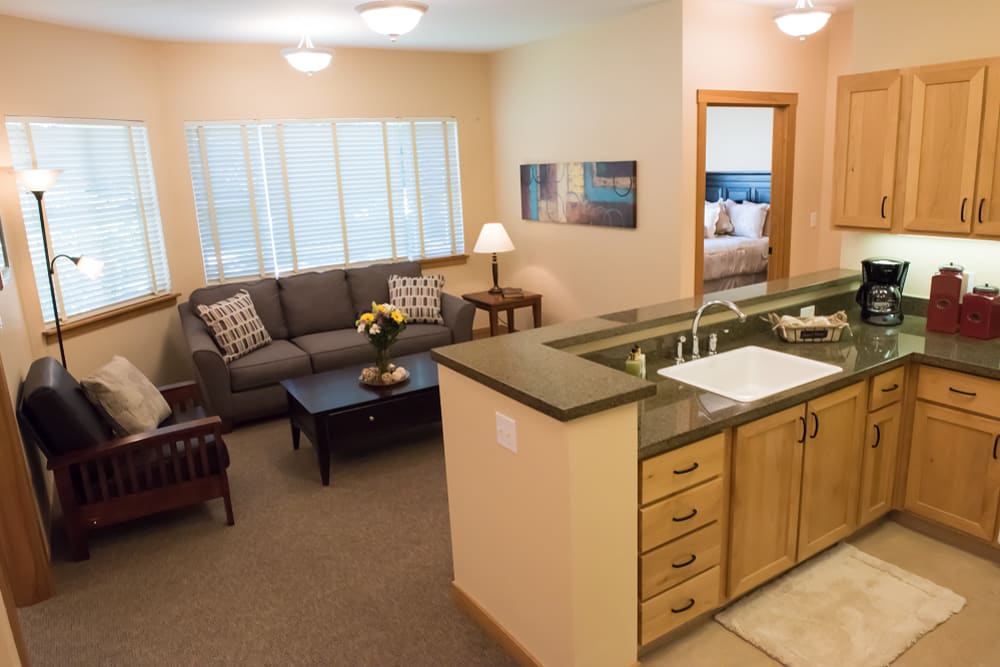 Spacious living area in assisted living apartment at The Springs at Wilsonville in Wilsonville, Oregon