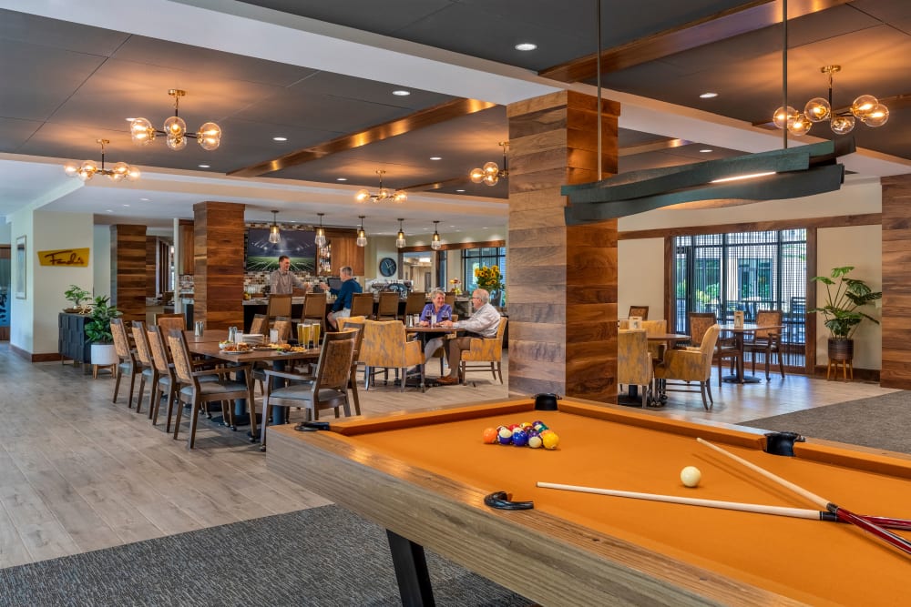 Activity room with space for gatherings and games at The Springs at Lake Oswego in Lake Oswego, Oregon