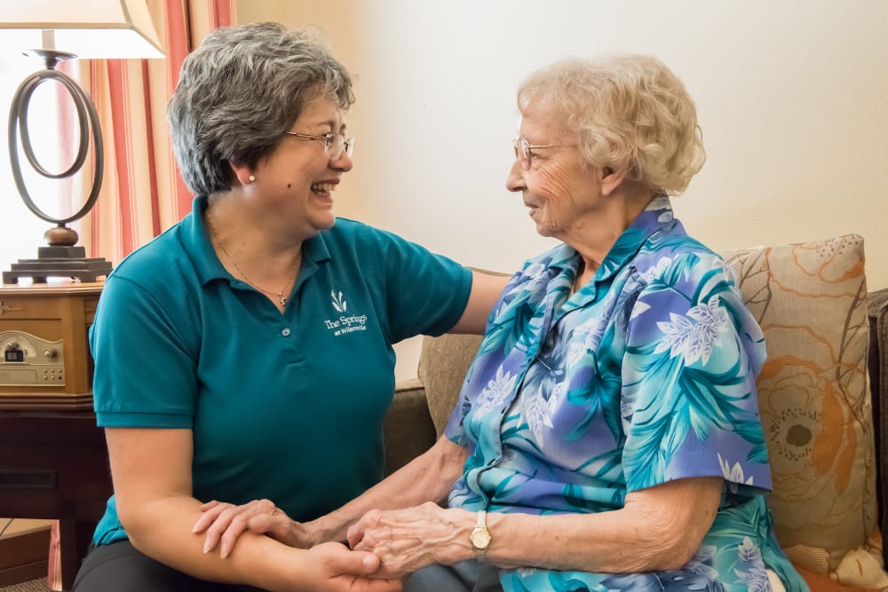Caregiver with resident at The Springs at Wilsonville in Wilsonville, Oregon