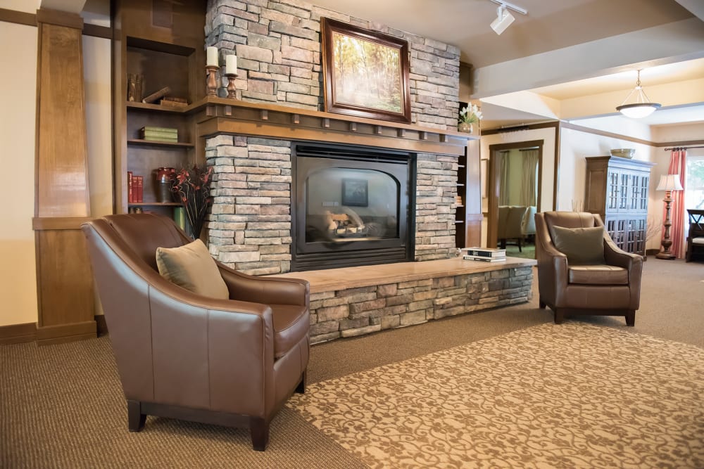 Beautiful stone fireplace at The Springs at Wilsonville in Wilsonville, Oregon