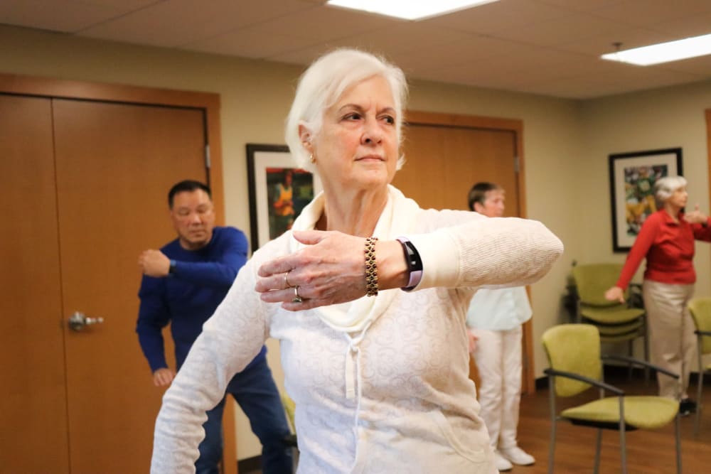 Residents partaking in group fitness class at The Springs at Carman Oaks in Lake Oswego, Oregon
