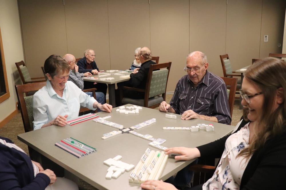 Residents playing dominos at The Springs at Greer Gardens in Eugene, Oregon.