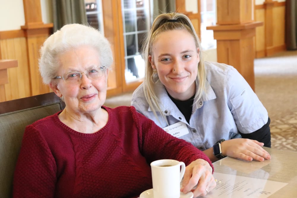 Resident and caregiver enjoying coffee at The Springs at Missoula in Missoula, Montana.