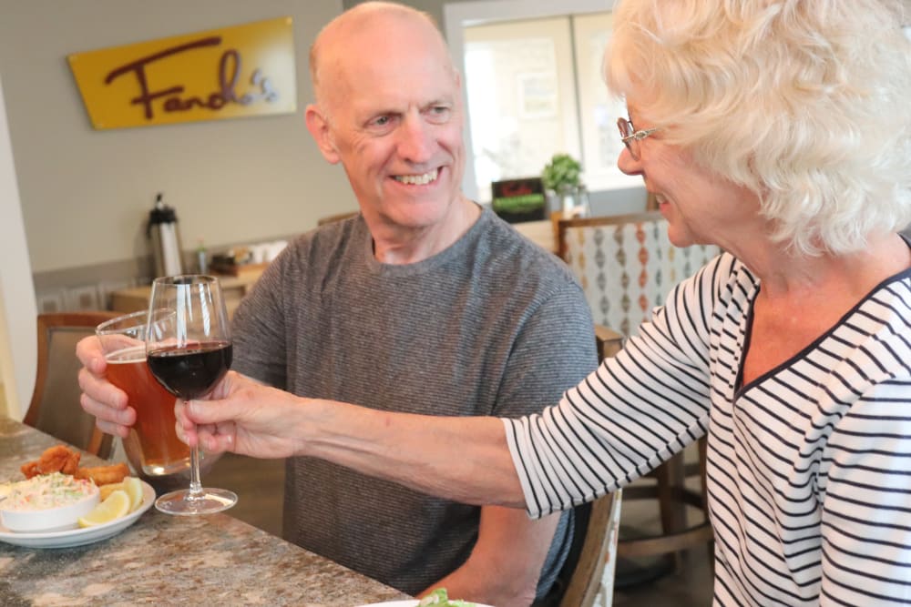 Two residents enjoying drinks at The Springs at Sherwood in Sherwood, Oregon