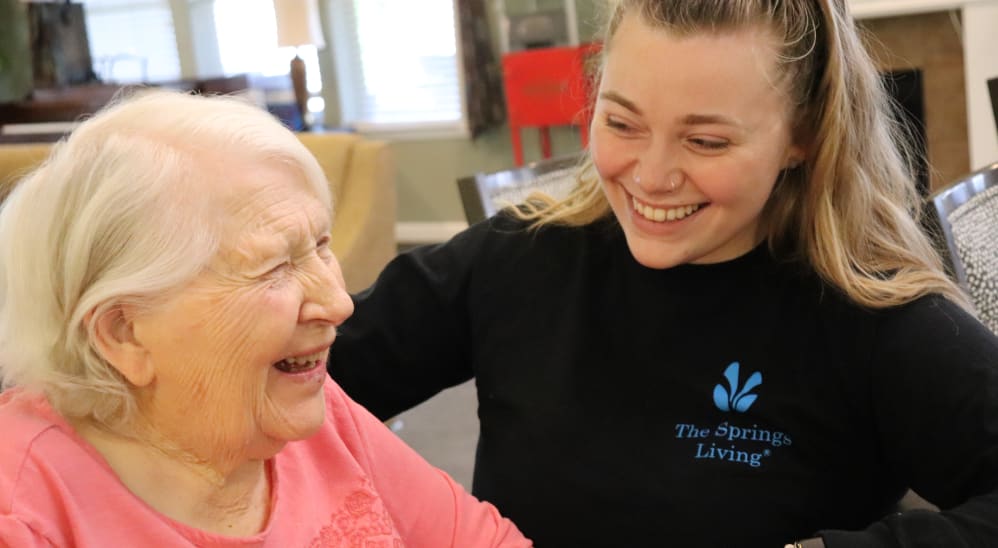 Resident with caregiver at The Springs at Clackamas Woods in Milwaukie, Oregon