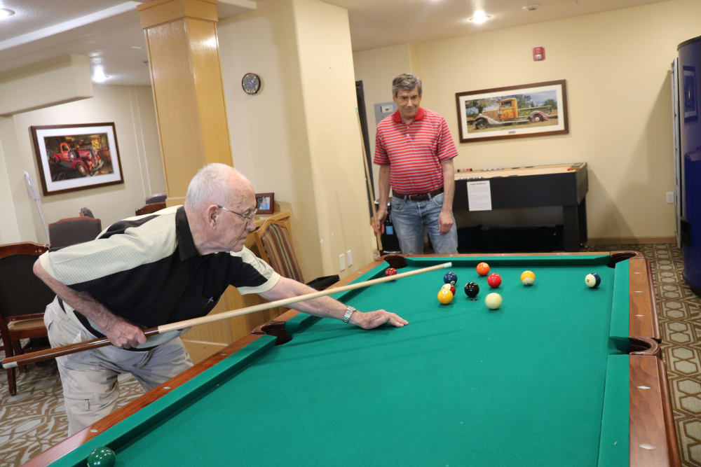 Residents playing billiards at The Springs at Sunnyview in Salem, Oregon