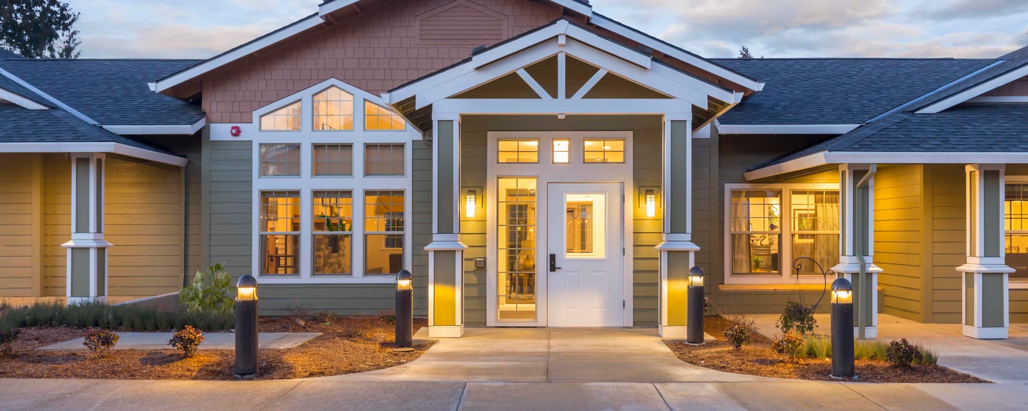 Well-lit front door entrance at The Springs at Clackamas Woods in Milwaukie, Oregon