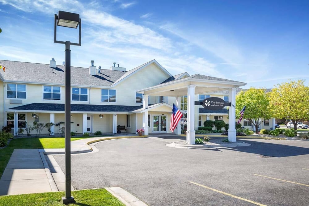 Elegant entryway to upscale senior living facility at The Springs at Grand Park in Billings, Montana