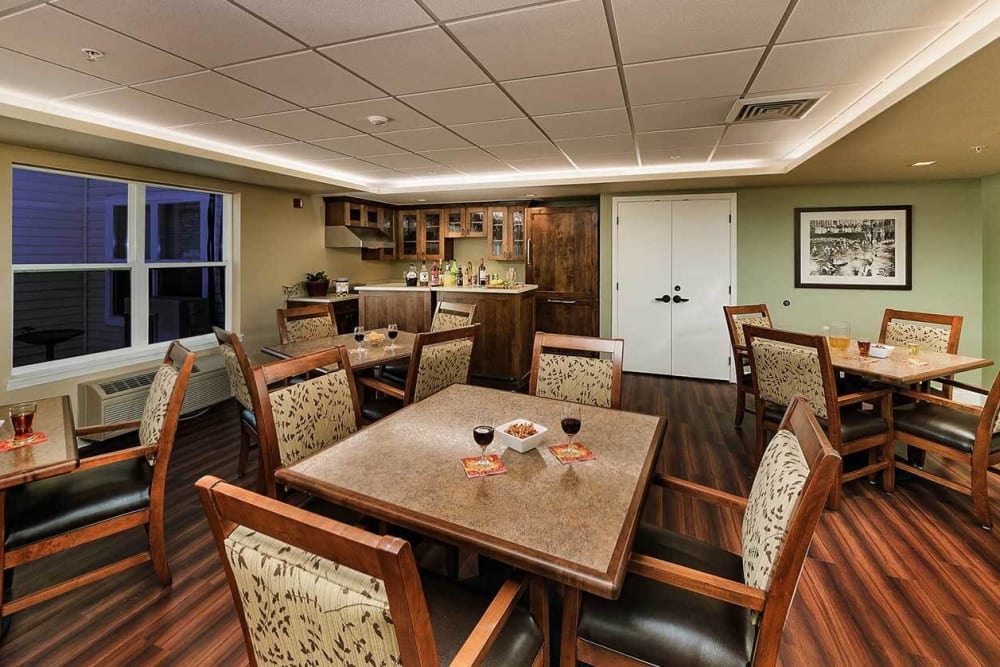 Inviting game room with wood accents atThe Springs at Grand Park in Billings, Montana