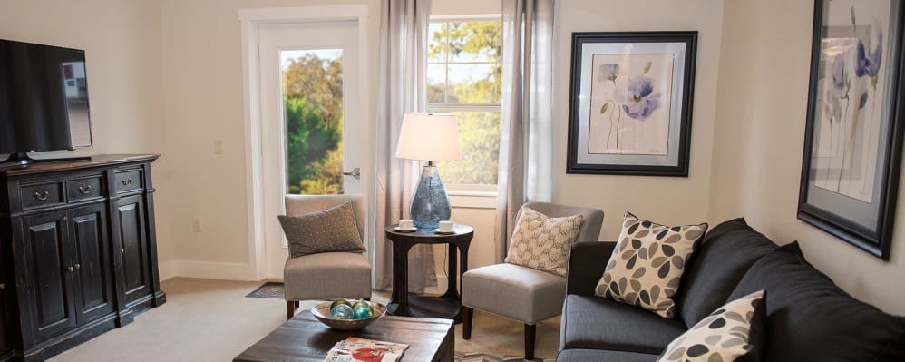 Stylish living room at The Springs at Greer Gardens in Eugene, Oregon