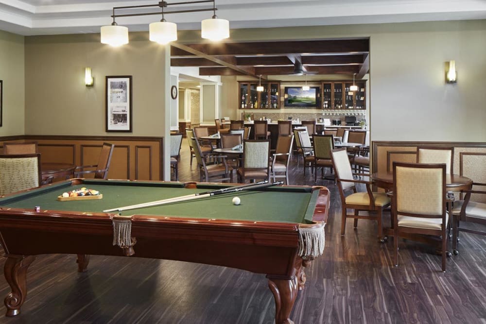 Deluxe game room with pool table at upscale senior living facility at {location_name}} in Medford, Oregon